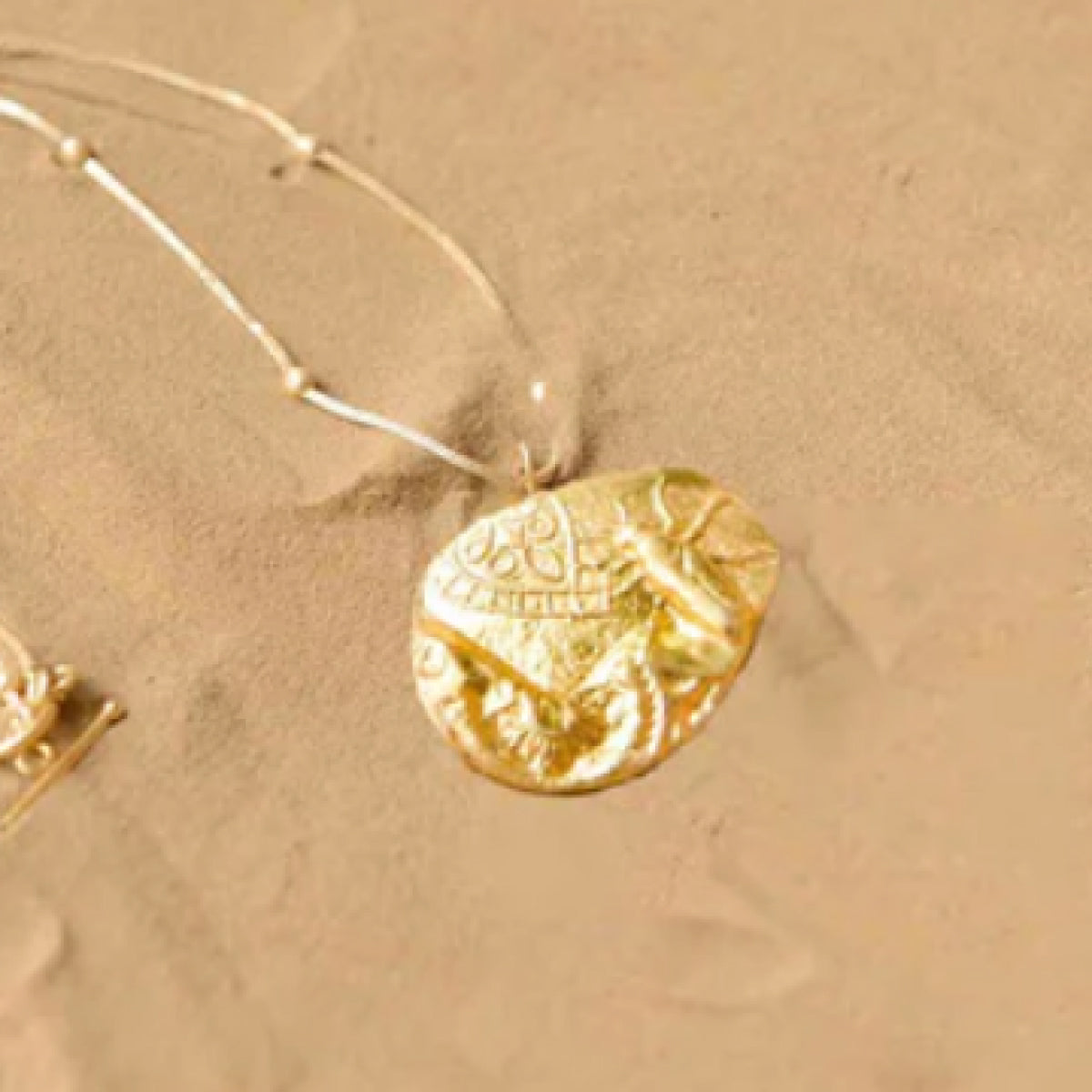 FOSSIL PENDENT L 3