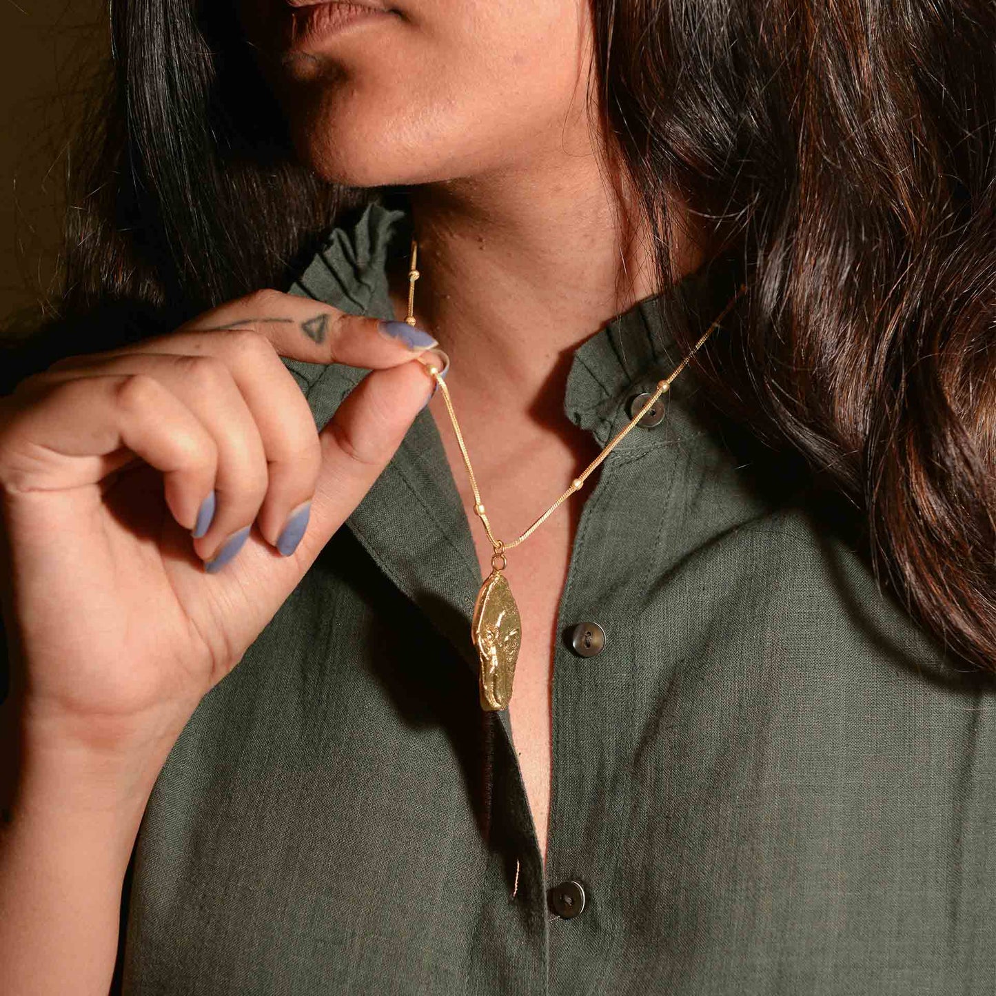 FOSSIL PENDENT M 4