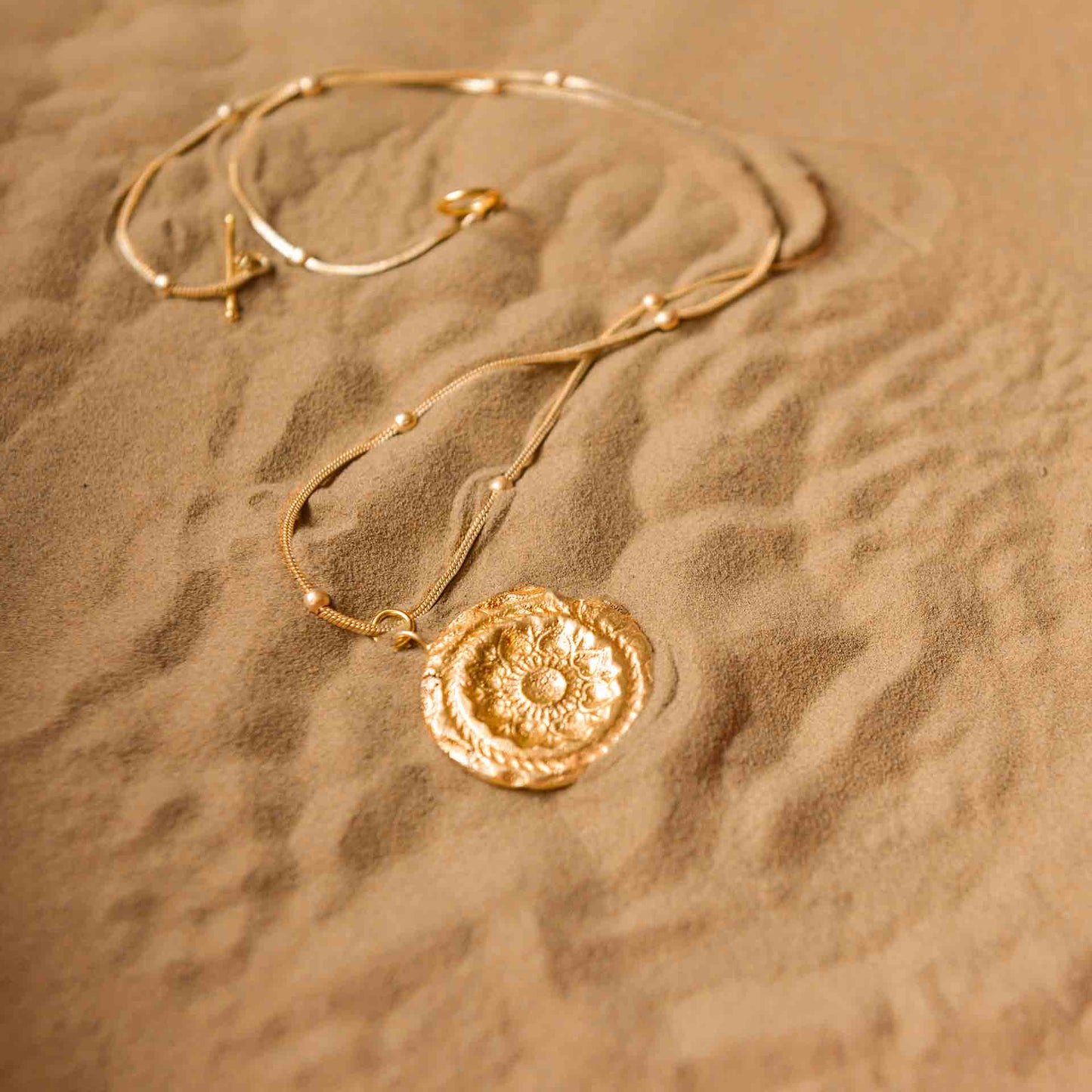 FOSSIL PENDENT L 1